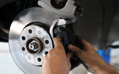 Brake pad replacement in car service